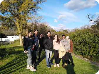 Group of learners standing together outdoors during a class outing
